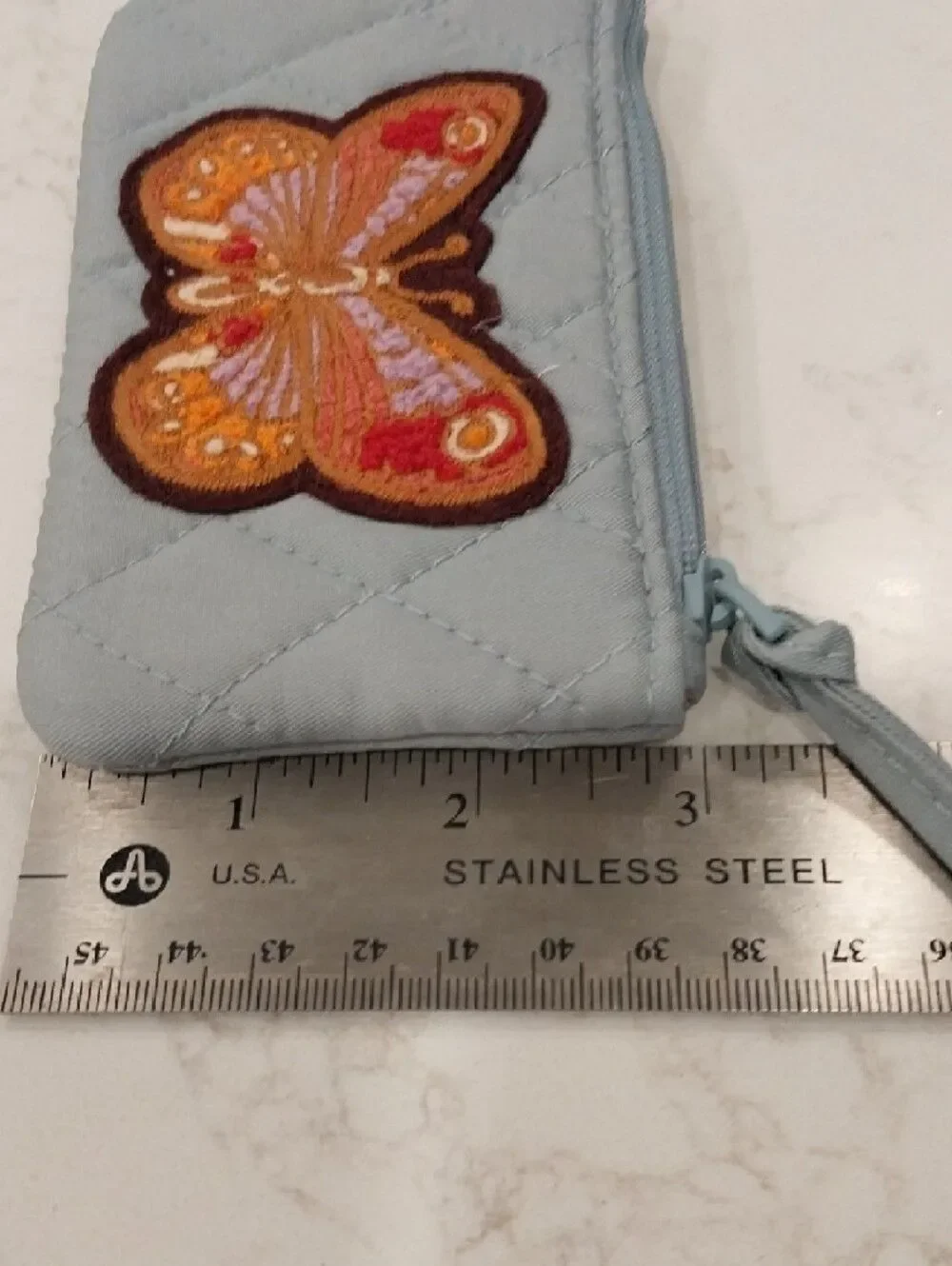 Vera Bradley Light Blue Quilted Wristlet with Orange Butterfly Patch And Lanyard